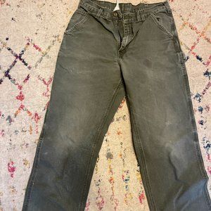 Men's green Carhartt utility work pants in moss